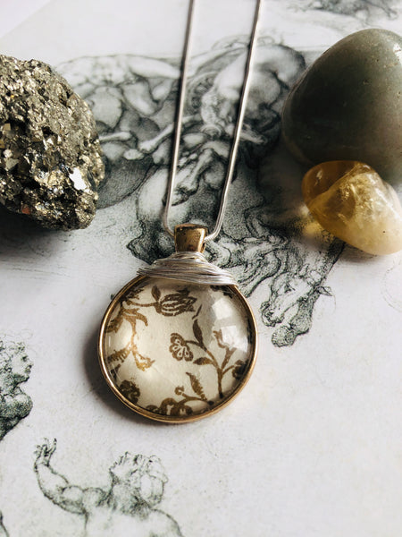 Gold vintage print pendant