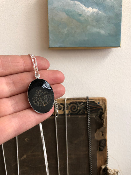 Hydrangea petal skeleton in resin