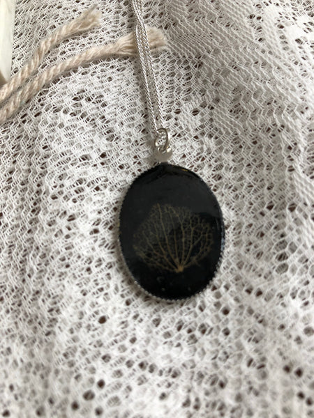 Hydrangea petal skeleton in resin