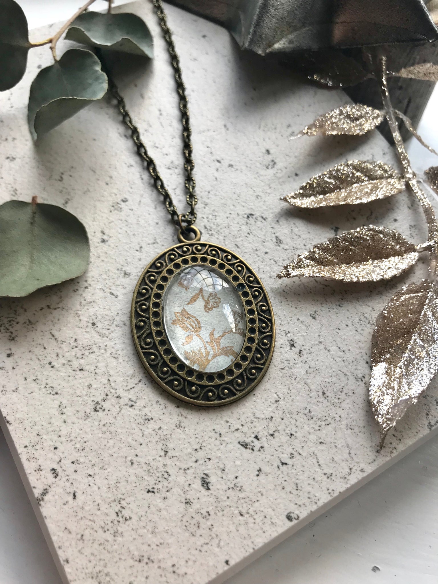Gold floral print pendant