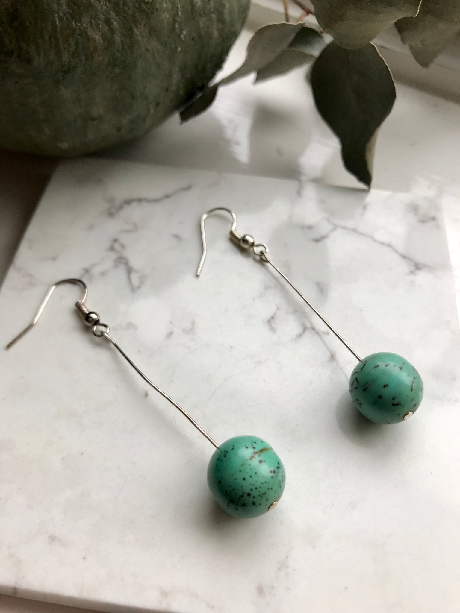 Silver and green drop earrings