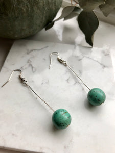Silver and green drop earrings