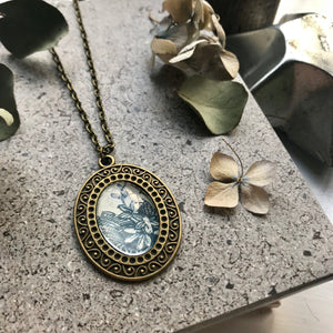 Bronze, blue floral pendant