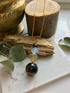 Drop pendant on Gold chain