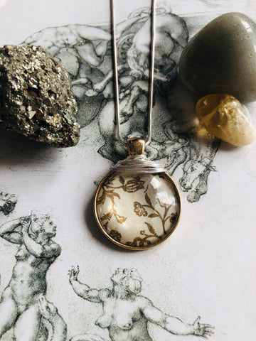 Gold vintage print pendant